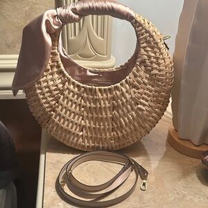 Chic Tan Woven Shoulder Bag with Pink Satin Details